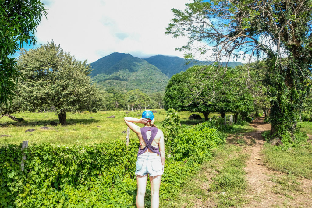 Elsbeth staring at Volcan Maderas on the trail to the San Ramon Waterfall