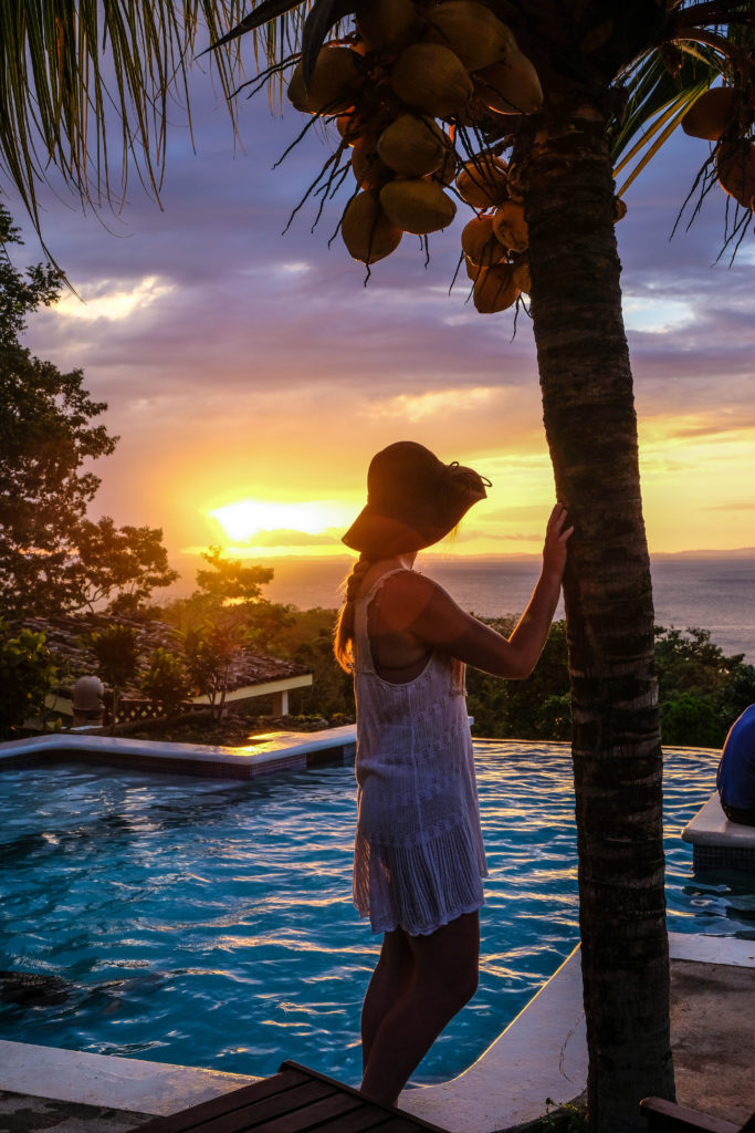 Elsbeth staring at the sunset over Lago Cocibolca at La Omaja on Isla de Ometepe