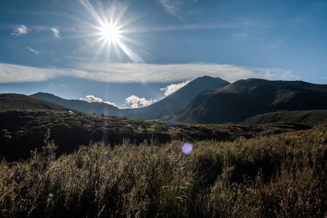 The sun hanging low over the start of the Tongariro Alpine Crossing